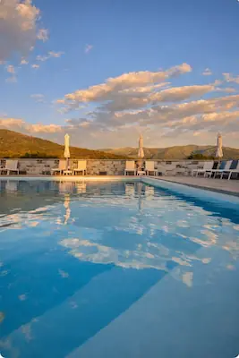 Outdoor swimming pool at Hôtel Résidence A Torra in Vescovato, near Bastia