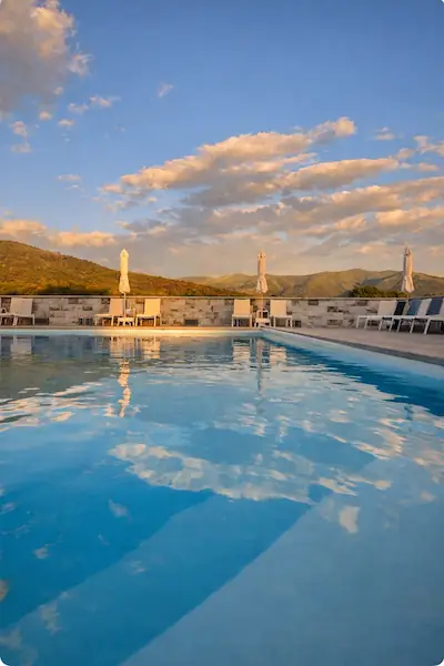 Outdoor swimming pool at Hôtel Résidence A Torra in Vescovato near Bastia